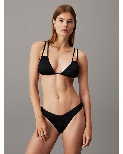 Parte de arriba de bikini de triángulo - CK Monogram Texture Calvin Klein de color Black