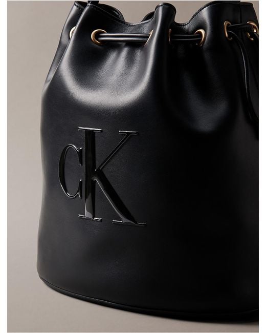 Calvin Klein Black Embossed Monogram Logo Bucket Bag
