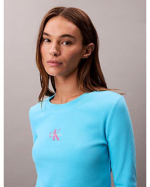 Calvin Klein Blue Jeans Monologo Long Sleeve Rib Baby Tee