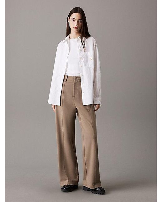 Calvin Klein Broek Met Wijde Pijpen Van Milano Jersey in het Brown