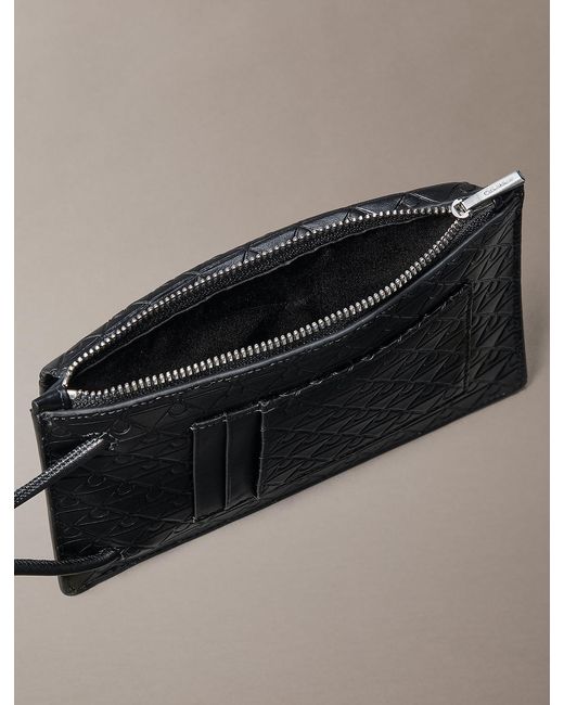 Calvin Klein Black Embossed Emblem Logo Phone Crossbody for men