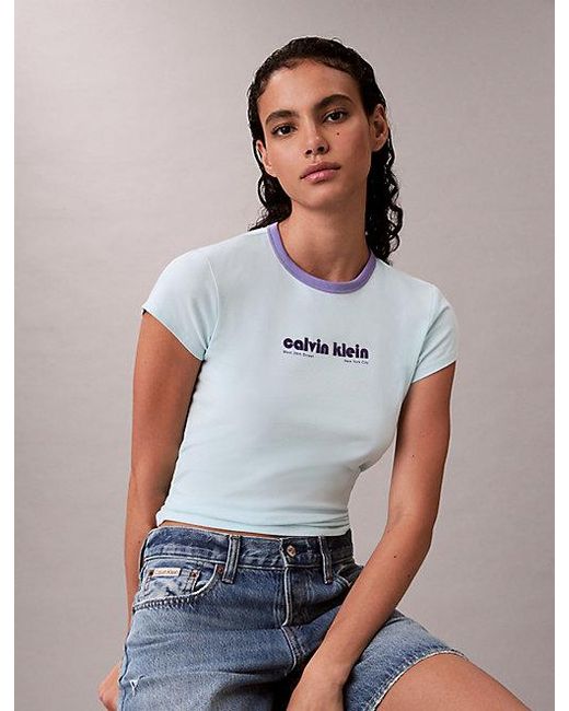 Calvin Klein White Jeans Logo Graphic Baby Tee
