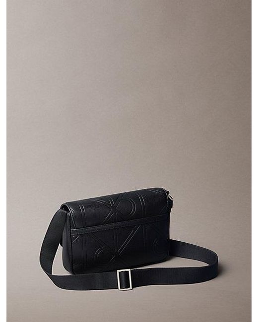 Calvin Klein Gray Embossed Emblem Logo Messenger Bag for men