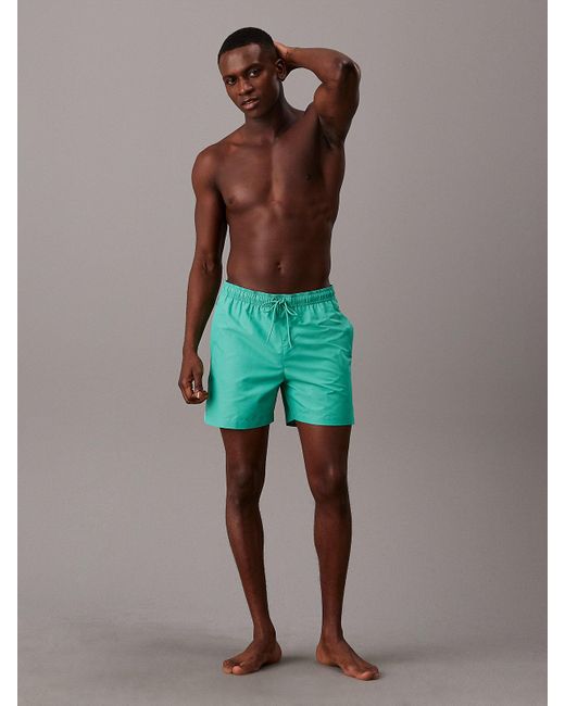 Short de bain mi-long avec cordon de serrage Calvin Klein pour homme en coloris Green