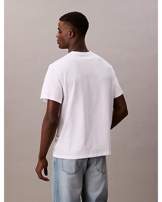 Calvin Klein White Jeans Acid Wash Logo T-Shirt for men
