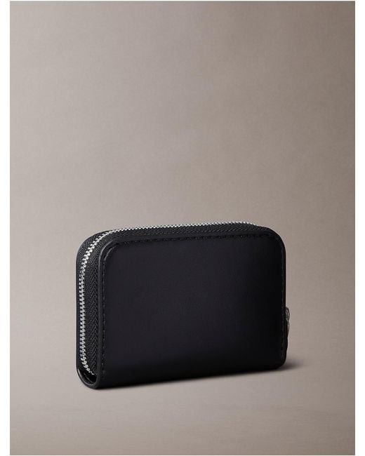 Calvin Klein Black Embossed Monogram Zip Wallet