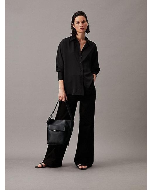Bolso saco Calvin Klein de color Black