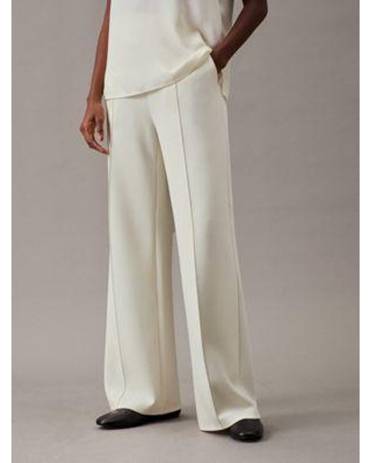 Pantalón de pierna ancha de punto técnico Calvin Klein de color White