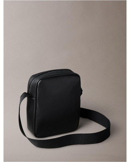 Calvin Klein Black Textured Zip Reporter Bag for men