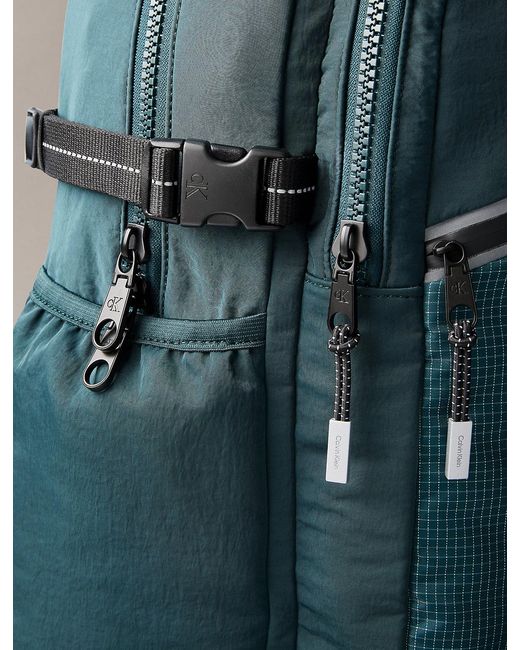 Calvin Klein Blue Striped Utility Zip Round Backpack for men