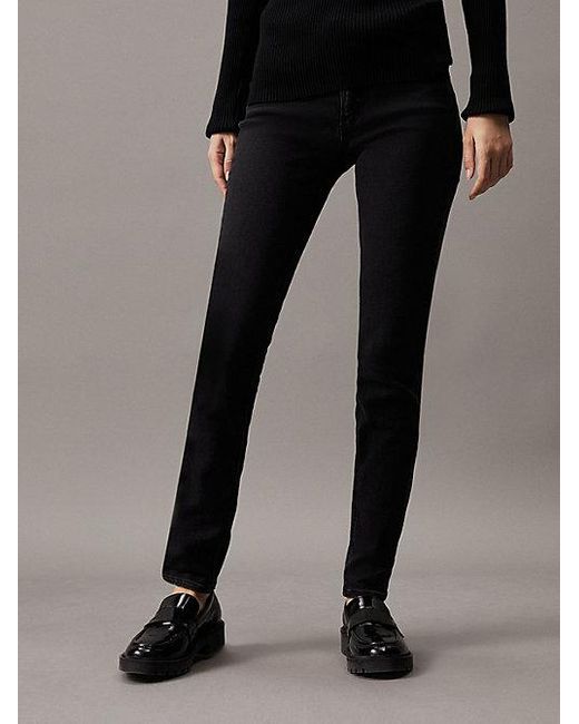 Mid Rise Skinny Jeans Calvin Klein de color Black