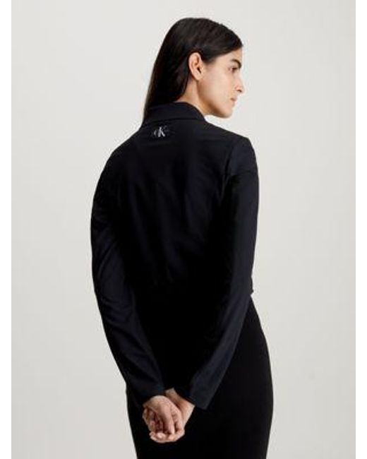 Chaqueta con cinturón de punto suave Calvin Klein de color Black