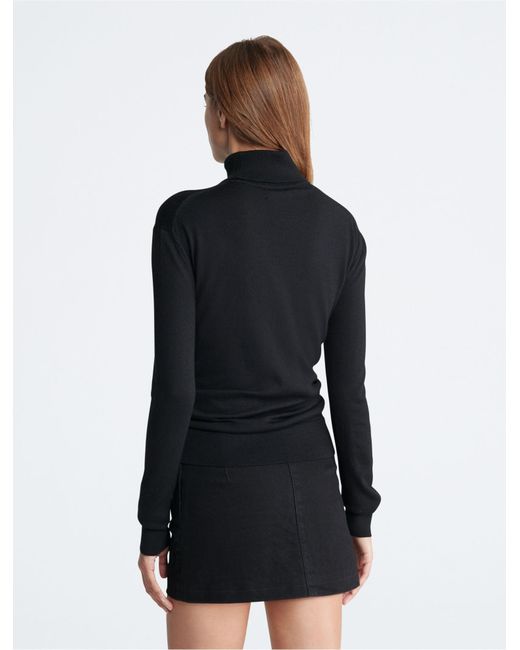 Black Merino Turtleneck Sweater