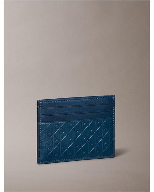 Calvin Klein Blue Embossed Allover Monogram Card Case for men