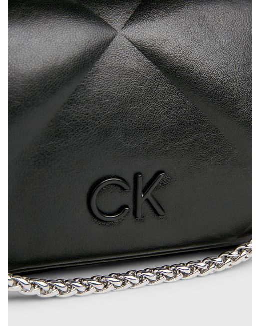 Sac de ceinture convertible matelassé Calvin Klein en coloris Black