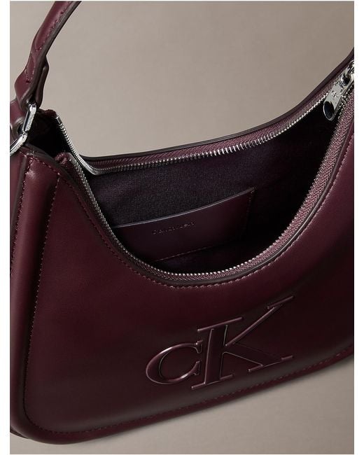 Calvin Klein Multicolor Embossed Monogram Crescent Bag
