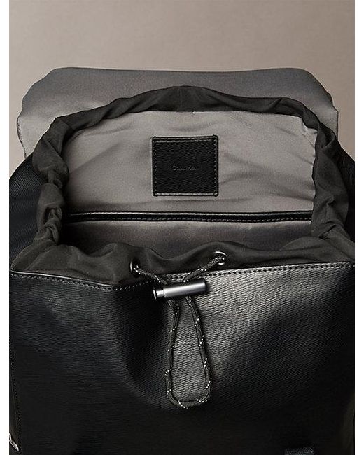 Calvin Klein Black Emblem Logo Saffiano Flap Backpack for men