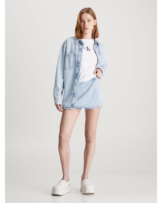 Jupe-short portefeuille en jean Calvin Klein en coloris Blue