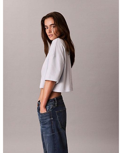 Calvin Klein Purple Jeans Cropped Varsity Logo T-Shirt