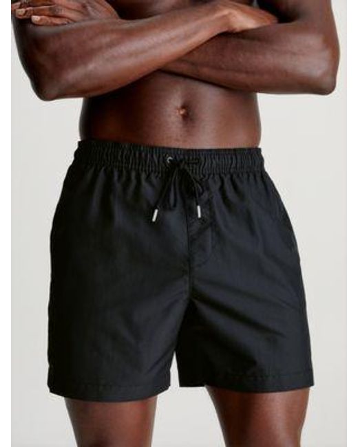 Bañador de largo medio con cordón Calvin Klein de hombre de color Black