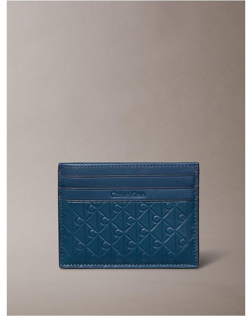 Calvin Klein Blue Embossed Allover Monogram Card Case for men