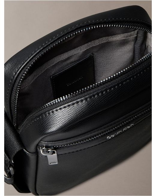 Calvin Klein Black Textured Zip Reporter Bag for men