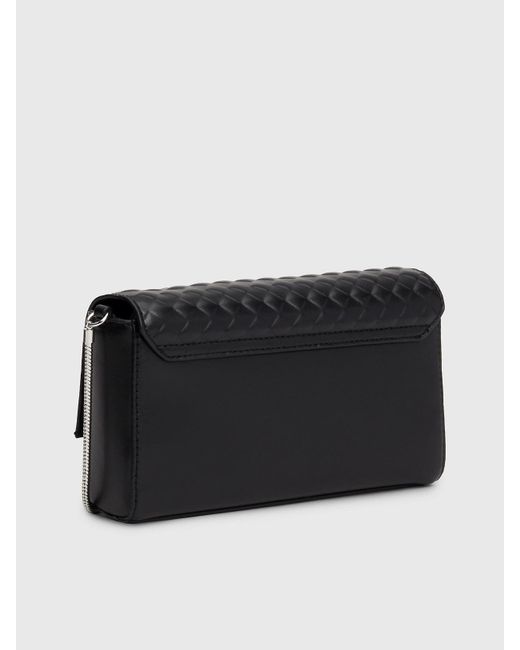 Petit sac en bandoulière matelassé Calvin Klein en coloris Black