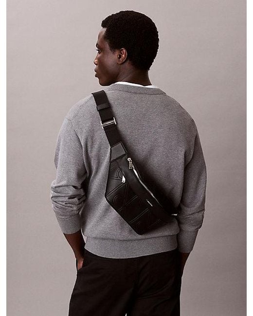 Calvin Klein Black Embossed Emblem Logo Bum Bag for men