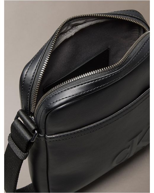 Calvin Klein Black Embossed Monogram Logo Reporter Bag for men