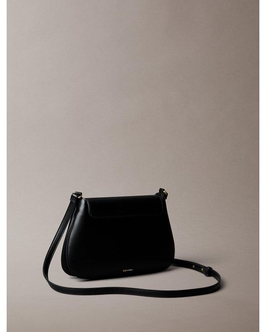 Calvin Klein Black Engraved Medium Flap Crossbody Bag