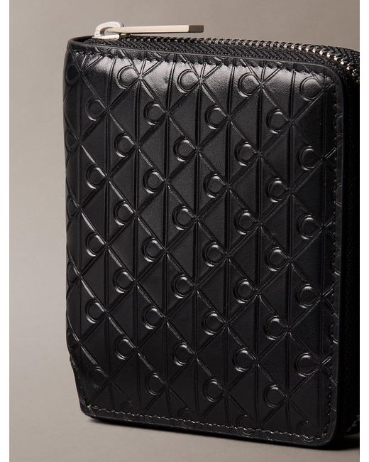 Calvin Klein Black Embossed Allover Monogram Zip Bifold Wallet for men