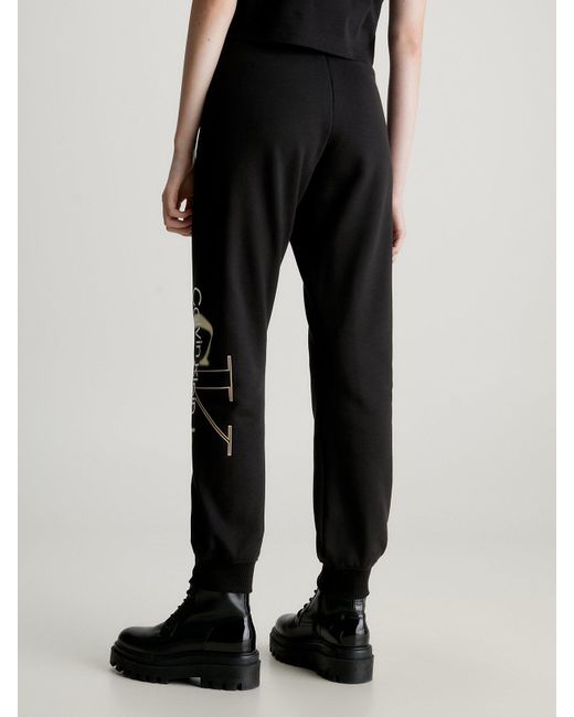 Pantalon de jogging en polaire de coton Calvin Klein en coloris Black