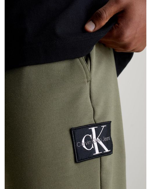 Calvin Klein Green Skinny Terry Badge Joggers for men