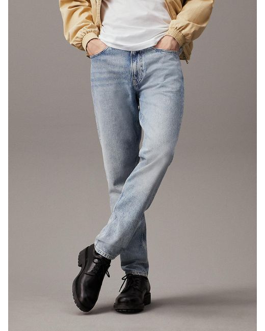 Jean regular tapered Calvin Klein pour homme en coloris Gray