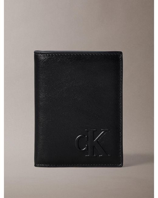 Calvin Klein Black Embossed Monogram Bifold Wallet for men
