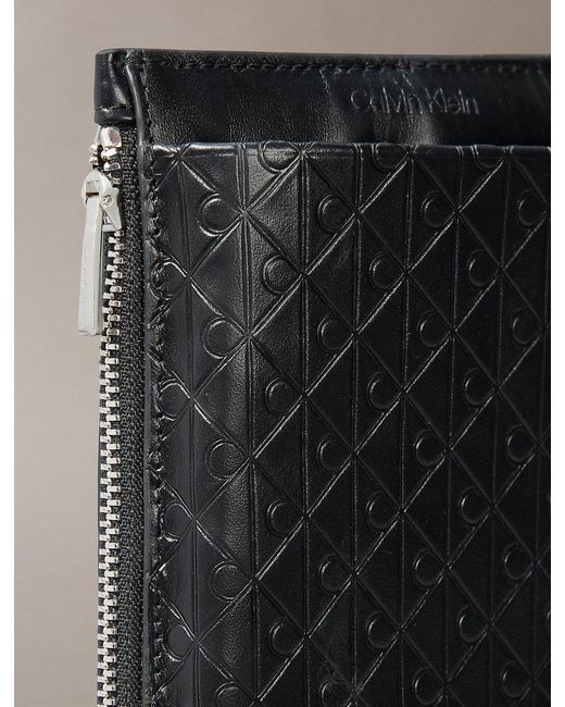 Calvin Klein Black Embossed Emblem Logo Phone Crossbody for men