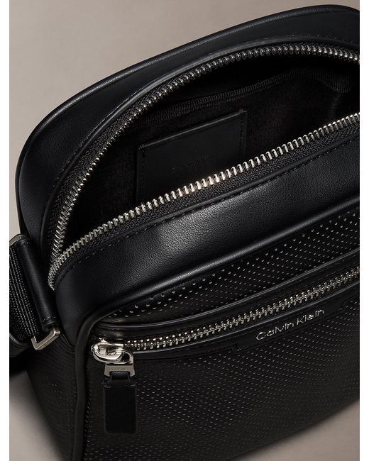 Calvin Klein Black Perforated Faux Leather Reporter Bag for men