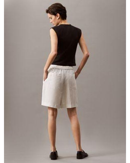 Shorts anchos de lino y lyocell Calvin Klein de color Natural