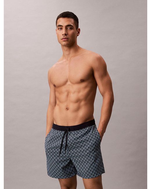 Calvin Klein Blue All-Over Logo Drawstring Swim Shorts for men