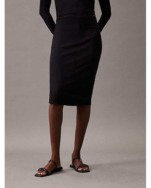 Falda lápiz de canalé slim Calvin Klein de color Black