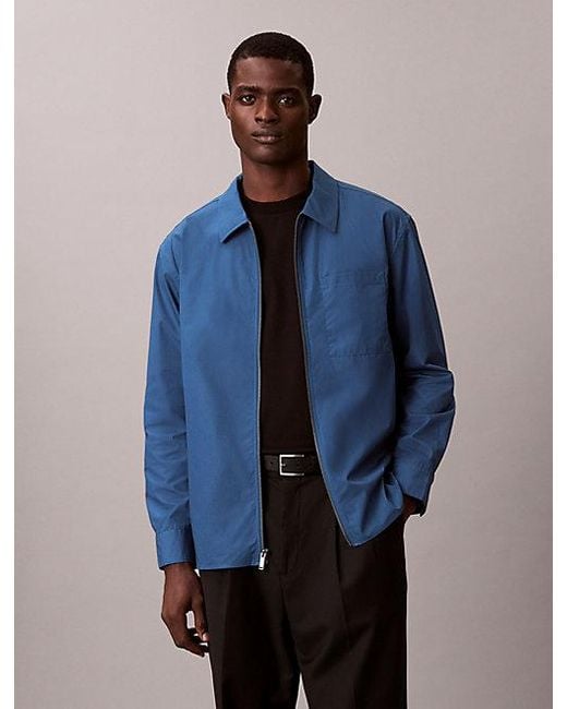 Sobrecamisa holgada de popelín con cremallera Calvin Klein de hombre de color Blue