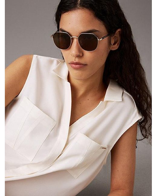 Calvin Klein Metallic Round Sunglasses