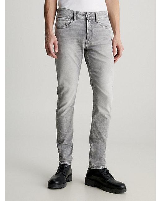 Calvin Klein Slim Tapered Jeans in het Gray voor heren