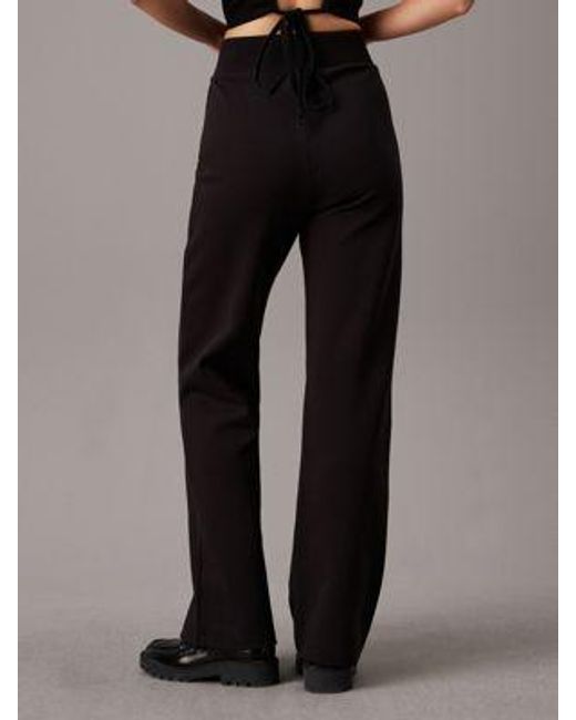 Pantalón de chándal acampanado con monograma Calvin Klein de color Black