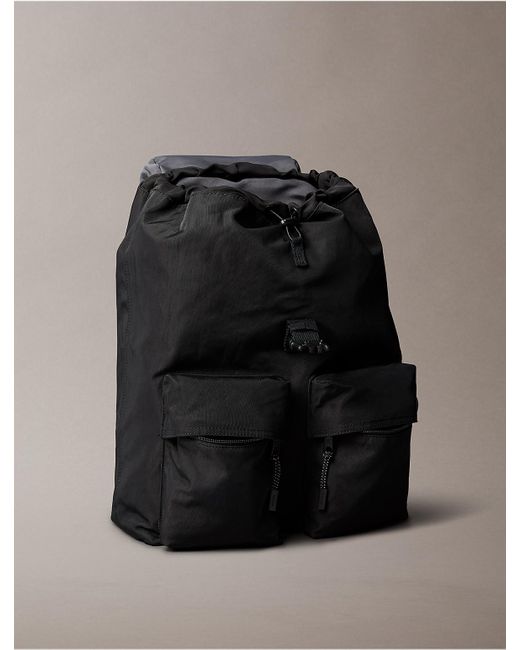 Calvin Klein Black Nylon Monogram Logo Top Flap Backpack for men