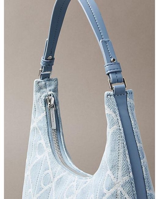 Calvin Klein Blue Denim Allover Emblem Logo Shoulder Bag
