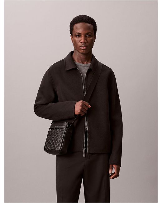 Calvin Klein Black Embossed Allover Monogram Reporter Bag for men