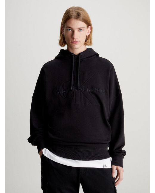 Sweat-shirt à capuche oversize avec monogramme Calvin Klein pour homme en coloris Black