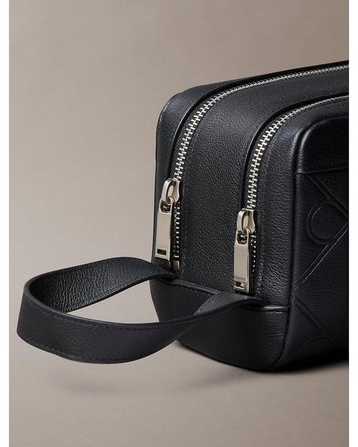 Calvin Klein Gray Embossed Emblem Logo Dopp Kit for men