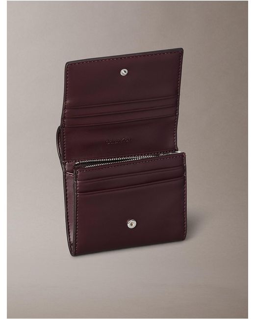 Calvin Klein Brown Embossed Monogram Bifold Wallet